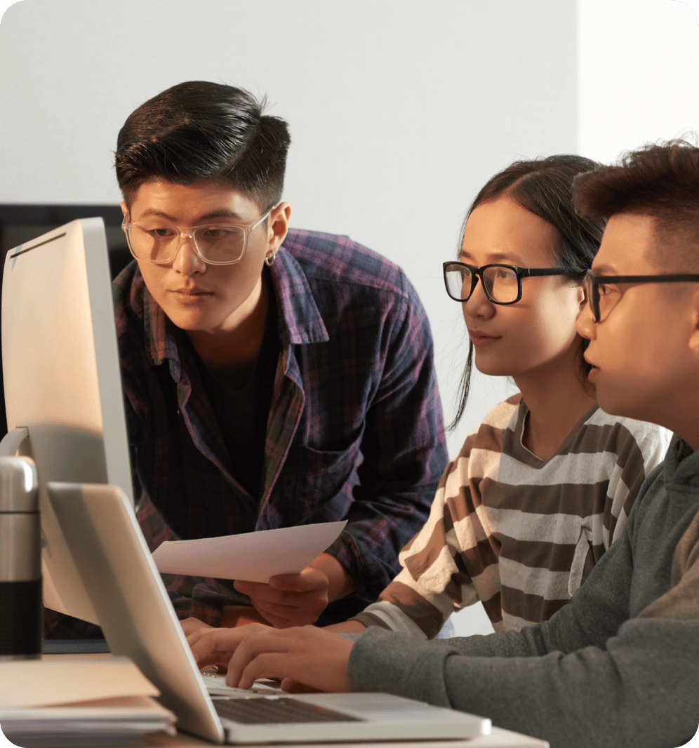 Engineering team reviewing software work