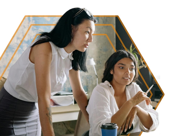 Two professionals discussing hiring strategy